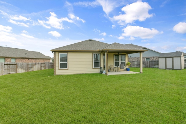 back of house featuring a yard and a patio