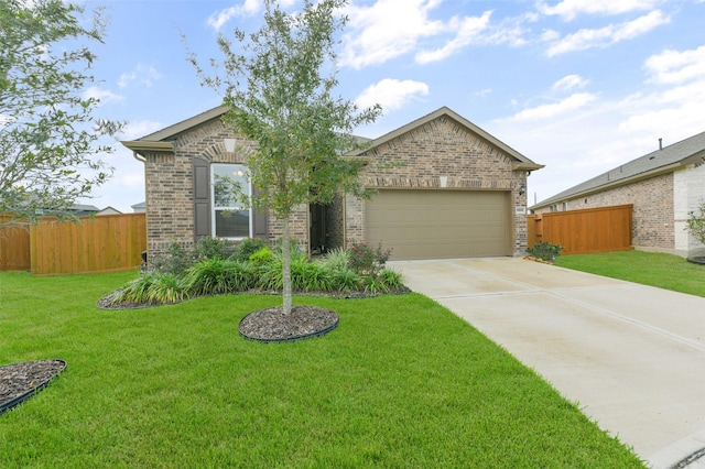 single story home with a garage and a front lawn