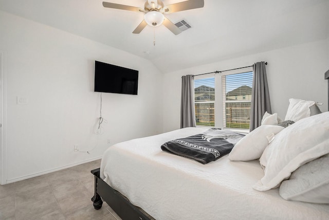 bedroom with ceiling fan and lofted ceiling