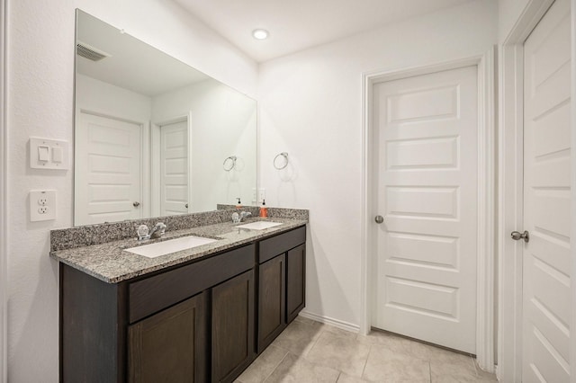 bathroom featuring vanity and tile patterned floors