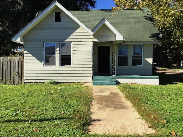 view of front of property with a front lawn