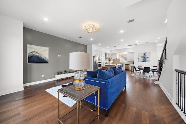 living room featuring dark hardwood / wood-style floors