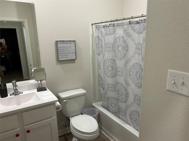 full bathroom featuring vanity, toilet, and shower / bath combo