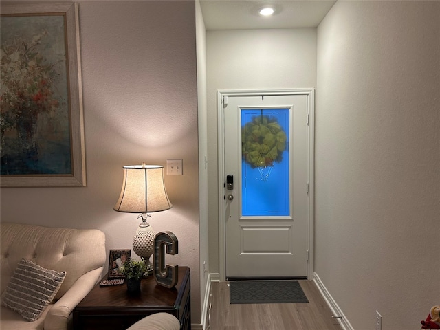 doorway featuring light hardwood / wood-style floors