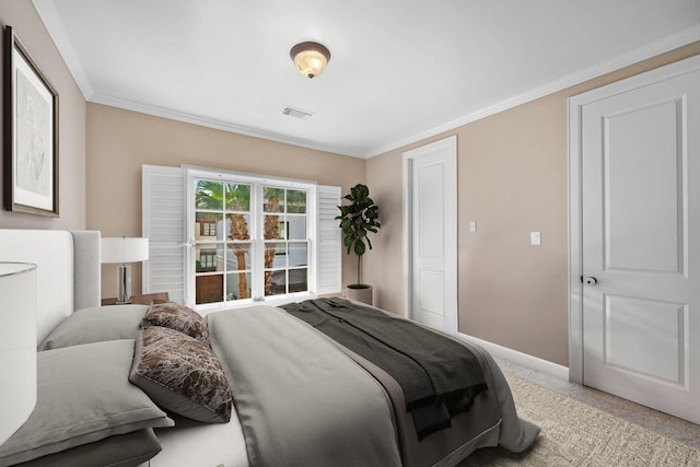 carpeted bedroom featuring ornamental molding