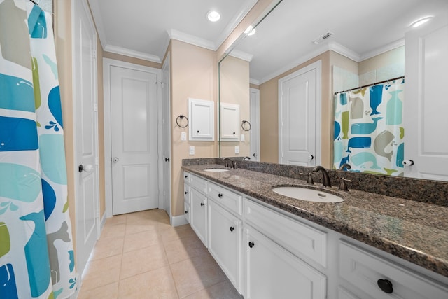 bathroom with tile patterned floors, crown molding, curtained shower, and vanity