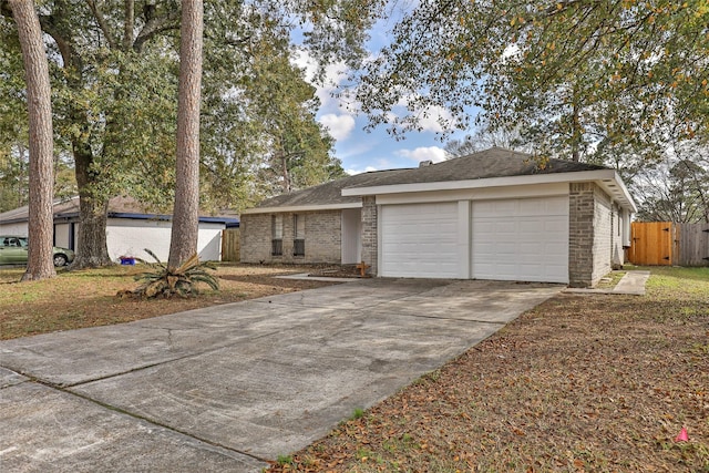 ranch-style house featuring a garage