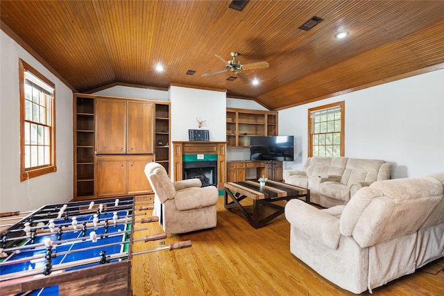 living room with light wood-type flooring, vaulted ceiling, and wooden ceiling