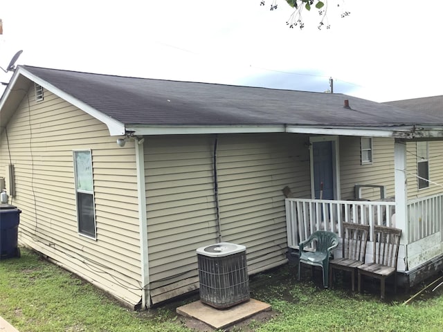 view of side of property featuring cooling unit