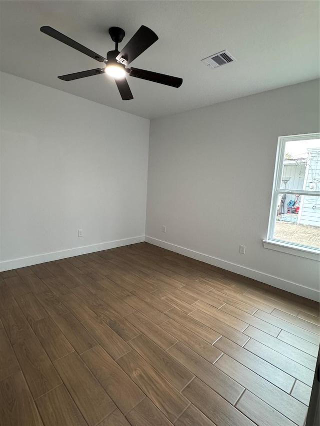 spare room with ceiling fan and light hardwood / wood-style flooring