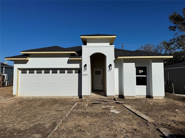 view of front of home with a garage