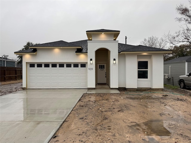 view of front of property with a garage