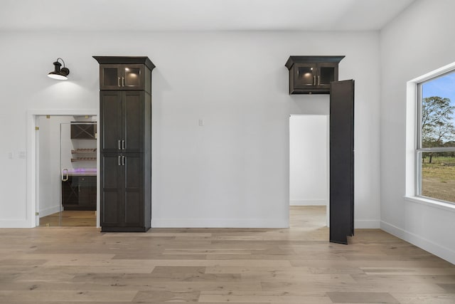 unfurnished room featuring light hardwood / wood-style floors