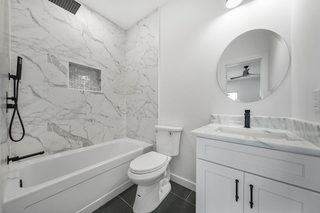 full bathroom featuring tile patterned flooring, vanity, toilet, and tiled shower / bath