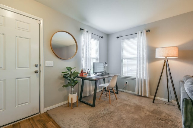 office space with light hardwood / wood-style floors