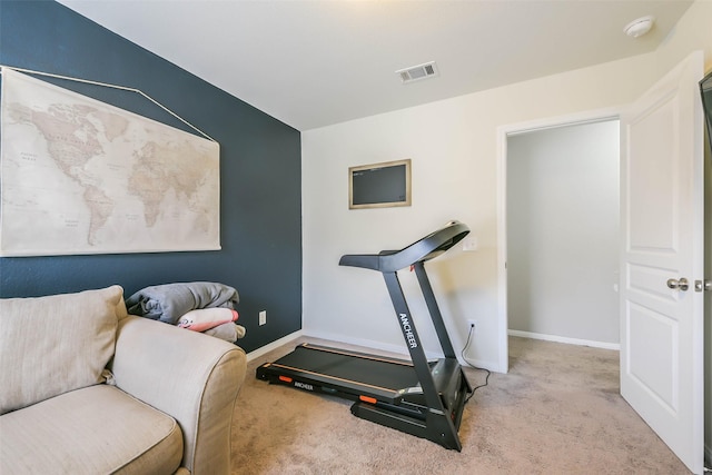 workout area with light colored carpet