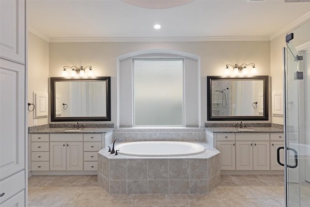 bathroom with tile patterned flooring, vanity, separate shower and tub, and crown molding