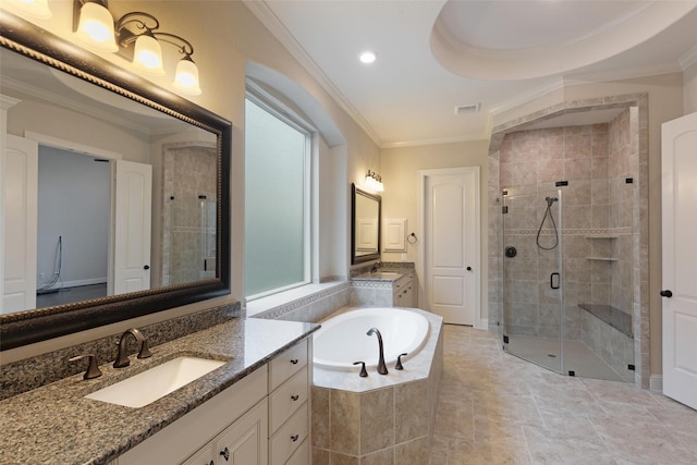 bathroom featuring plus walk in shower, vanity, and crown molding