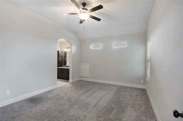 empty room with light colored carpet and ceiling fan