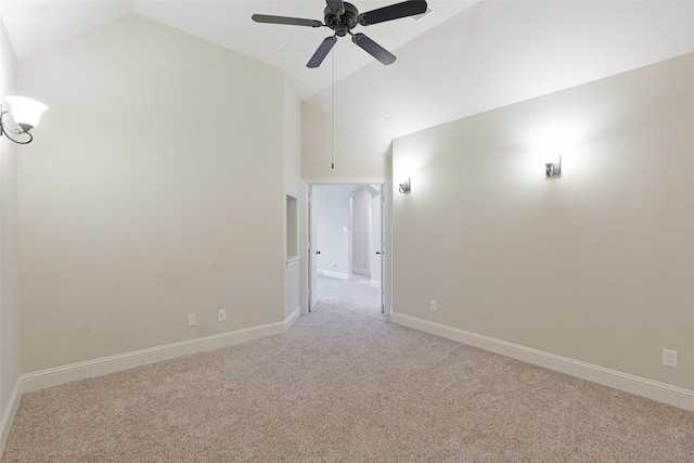 unfurnished room featuring light carpet, ceiling fan, and lofted ceiling