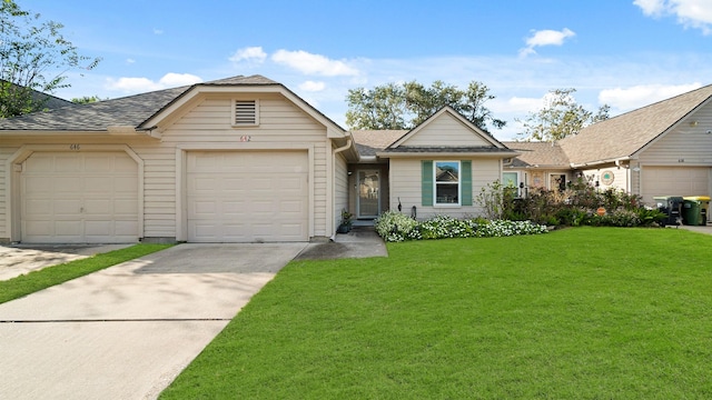 ranch-style home featuring a garage and a front lawn