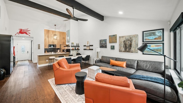 living room featuring beam ceiling, dark hardwood / wood-style flooring, high vaulted ceiling, and ceiling fan