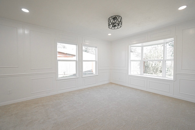 view of carpeted spare room