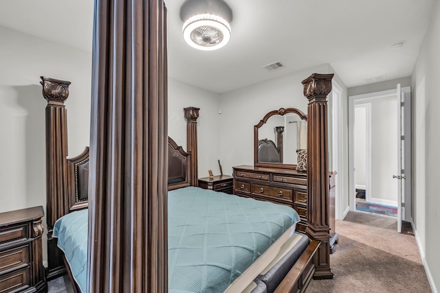 bedroom with dark carpet