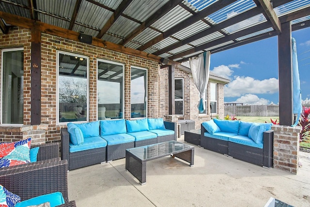 view of patio / terrace with outdoor lounge area and a pergola