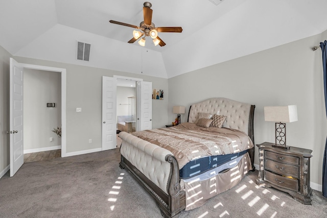 carpeted bedroom with ceiling fan and lofted ceiling