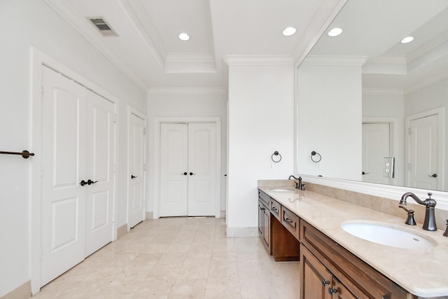 bathroom featuring vanity and crown molding