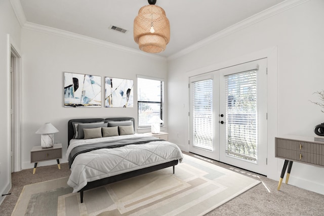 carpeted bedroom featuring french doors, access to outside, and crown molding