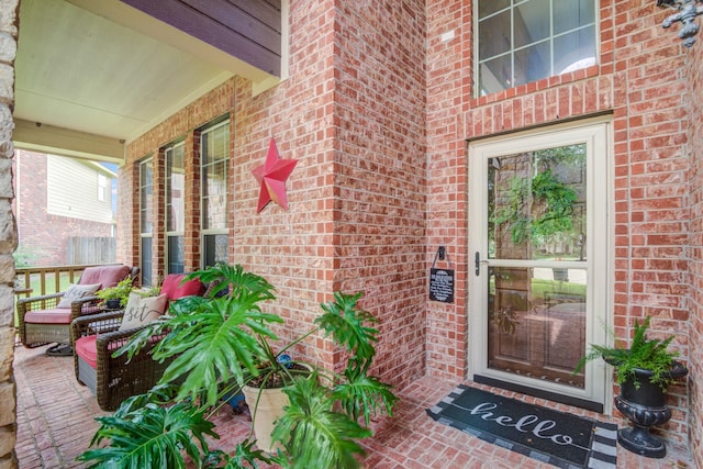 doorway to property with a porch