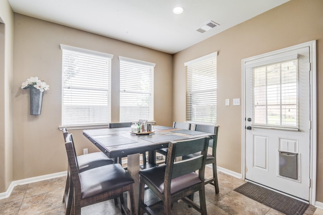 dining area featuring a wealth of natural light