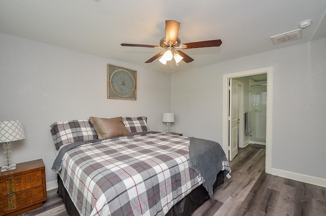 bedroom with ceiling fan and dark wood-type flooring