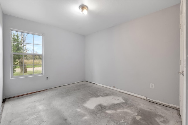 empty room featuring concrete flooring