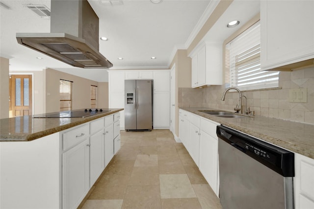 kitchen featuring sink, dark stone countertops, white cabinetry, island exhaust hood, and stainless steel appliances