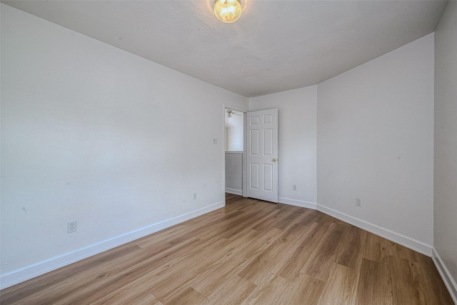 empty room featuring light hardwood / wood-style floors