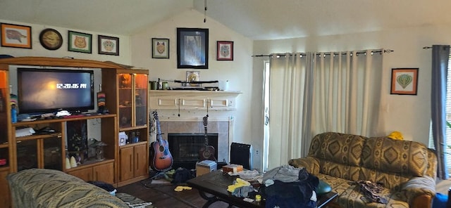 living room with a fireplace and lofted ceiling