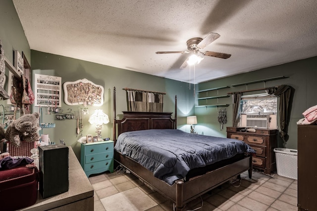 bedroom featuring a textured ceiling, ceiling fan, and cooling unit