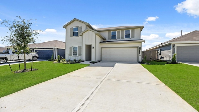 view of front facade with a garage and a front lawn