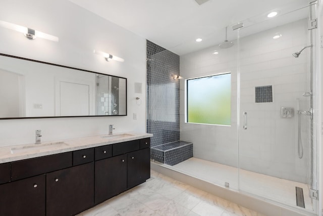 bathroom featuring vanity and walk in shower