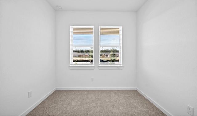 view of carpeted spare room