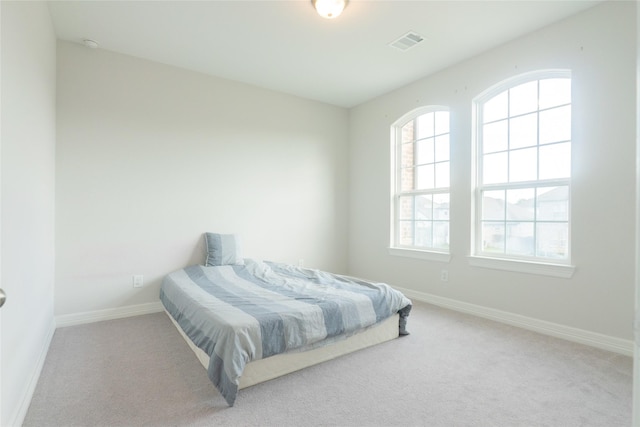 bedroom featuring carpet