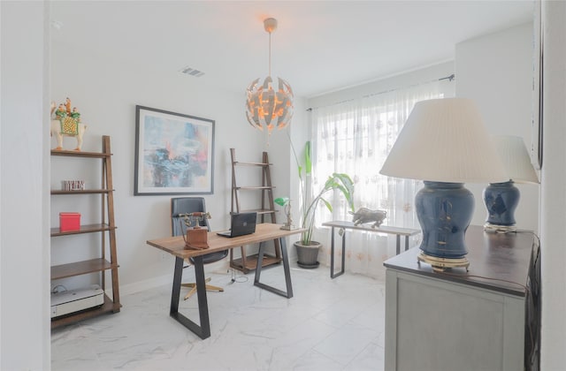 office with an inviting chandelier