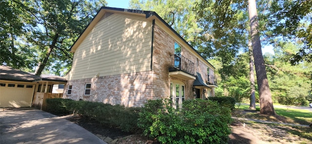 view of property exterior with a balcony