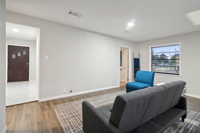 living area featuring hardwood / wood-style flooring