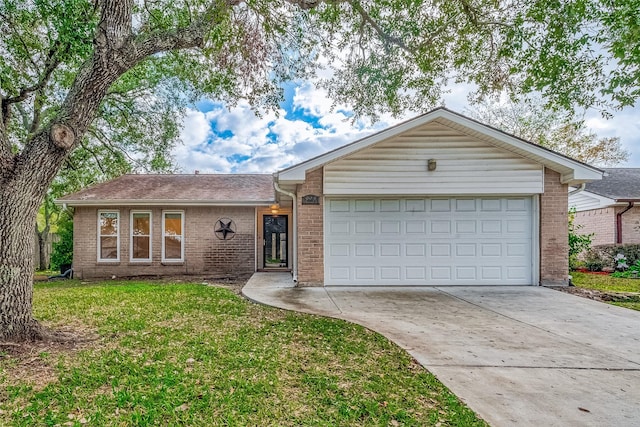 ranch-style home featuring driveway, an attached garage, a front yard, and brick siding