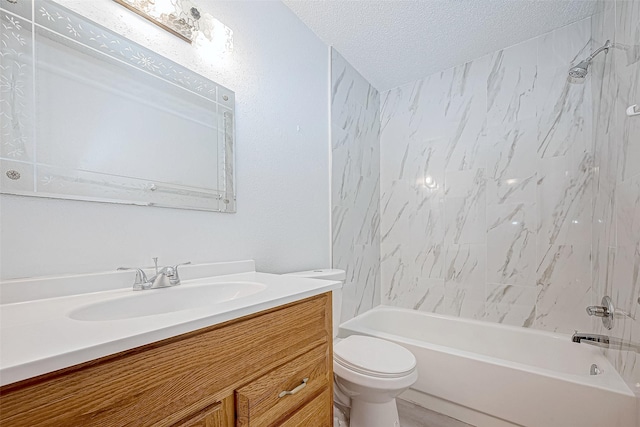 bathroom with toilet, washtub / shower combination, a textured ceiling, and vanity