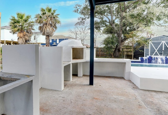 view of patio featuring a pool